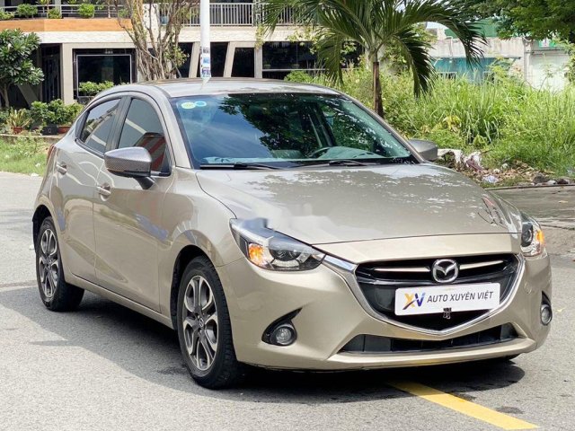 Cần bán lại xe Mazda 2 năm 2015, màu vàng chính chủ, 378tr0