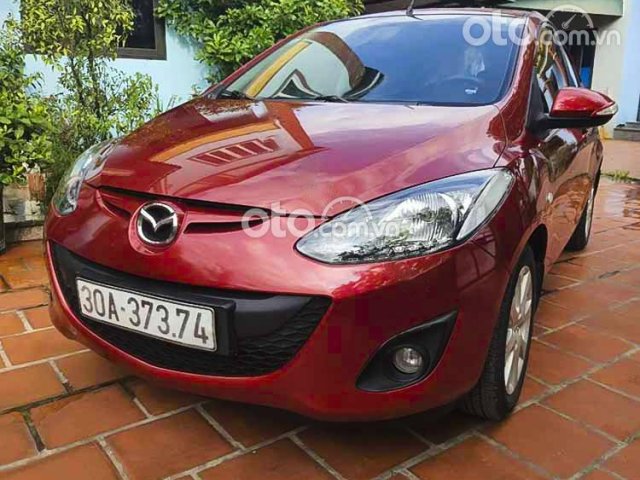 Cần bán gấp Mazda 2 năm 2014, màu đỏ còn mới0