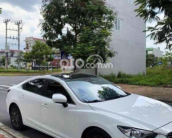 Bán Mazda 6 2.0 AT đời 2015, màu trắng chính chủ