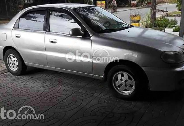 Cần bán gấp Daewoo Lanos sản xuất năm 2003, màu bạc chính chủ0