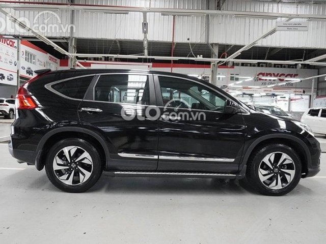 Cần bán lại xe Honda CR V sản xuất 2015, màu đen0