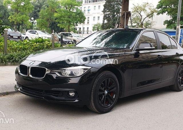 Cần bán BMW 320i đời 2016, màu đen còn mới, giá tốt0