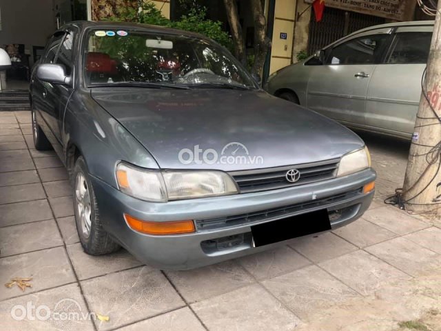 Cần bán gấp Toyota Corolla 1997, màu đen, nhập khẩu nguyên chiếc, giá 75tr0