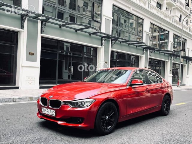 Bán BMW 320i sản xuất 2014, màu đỏ chính chủ, 775tr0