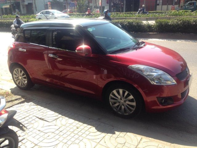 Cần bán lại xe Suzuki Swift sản xuất năm 2014, màu đỏ, giá tốt