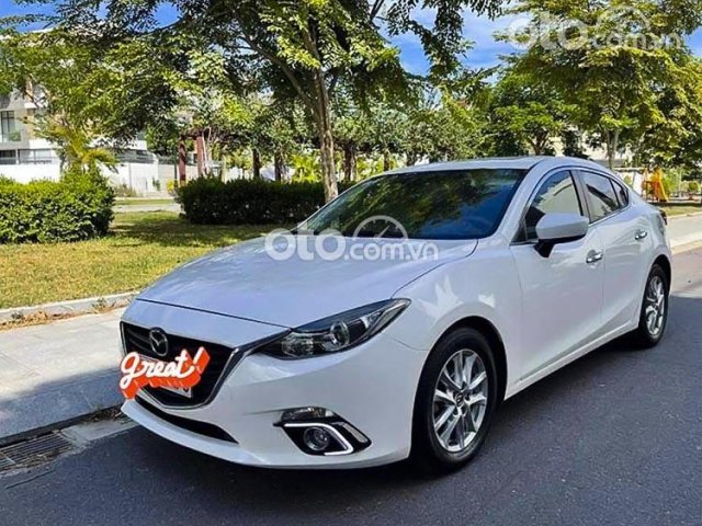 Bán Mazda 3 1.5 AT 2015, màu trắng chính chủ0