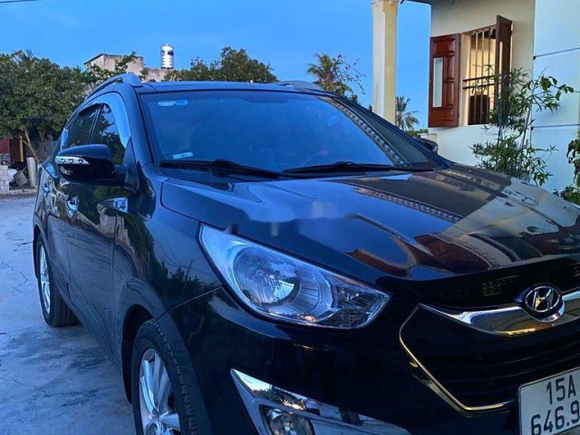 Bán xe Hyundai Tucson đời 2010, màu đen như mới0