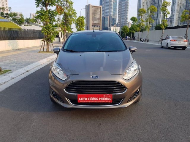 Cần bán gấp Ford Fiesta Titanium 1.5AT năm 2014, màu nâu0