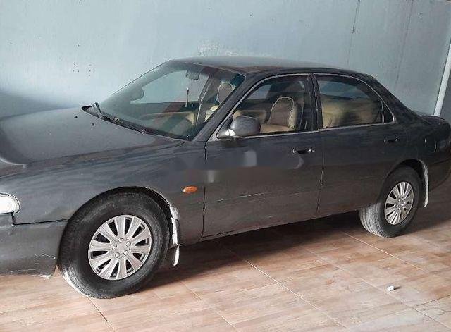 Cần bán gấp Mazda 626 1995, màu xám, xe nhập0