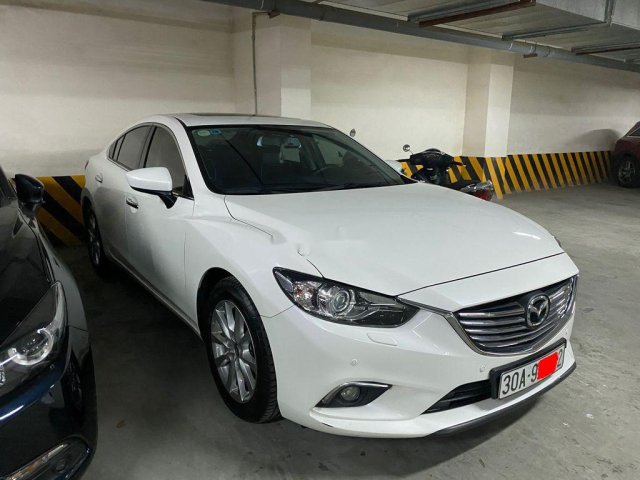 Cần bán lại xe Mazda 6 sản xuất năm 2016, màu trắng chính chủ, giá 610tr0