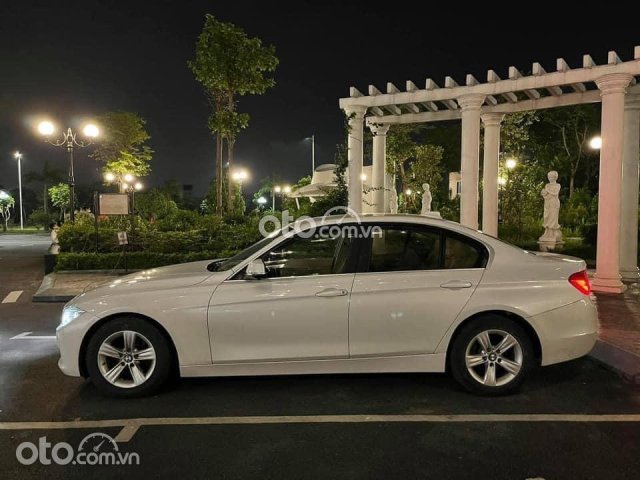 Bán BMW 320i SX năm 2014, màu trắng giá 790tr