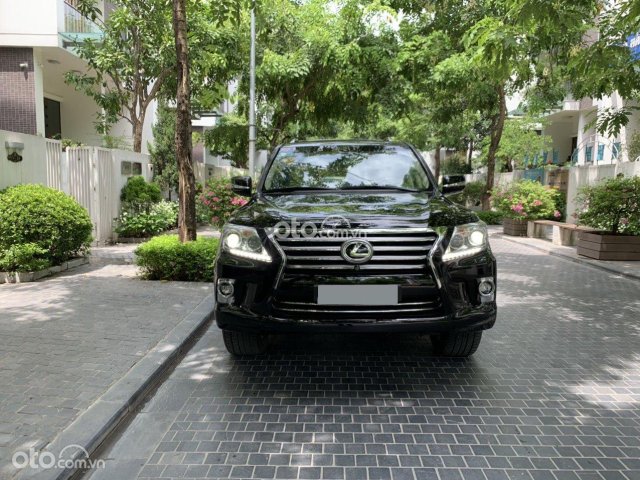 Bán Lexus LX 570 lên form 2015 màu đen nội thất kem, xe giữ gìn và cam kết0