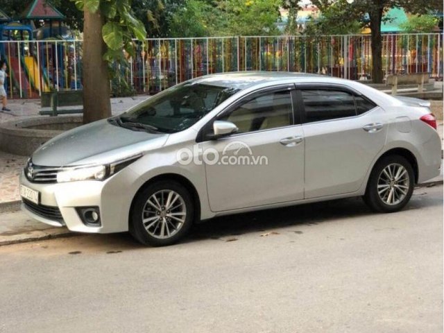 Bán Toyota Corolla Altis sản xuất 2015, màu bạc còn mới giá cạnh tranh0