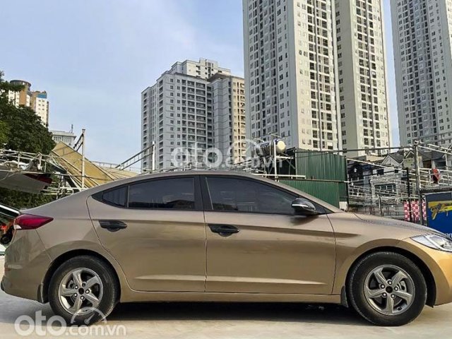 Xe Hyundai Elantra sản xuất 2016, màu nâu còn mới, 399 triệu