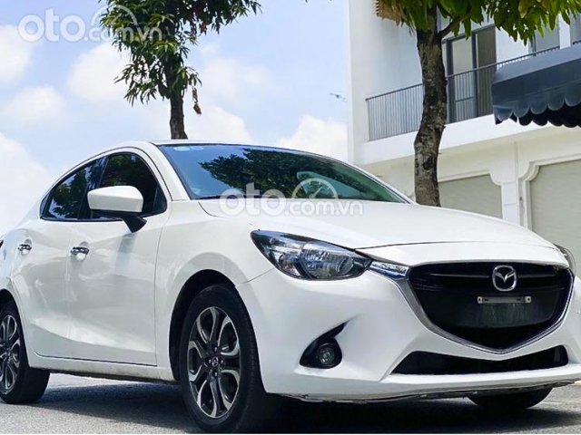 Bán Mazda 2 năm sản xuất 2016, màu trắng còn mới, giá tốt0