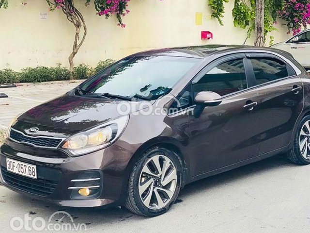 Bán ô tô Kia Rio sản xuất năm 2015, màu nâu, nhập khẩu, giá chỉ 410 triệu0