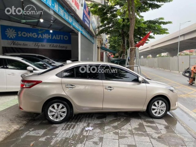 Bán Toyota Vios 1.5E CVT sx 2017 màu vàng cát0