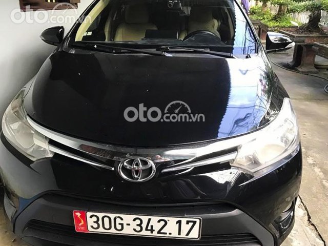Bán Toyota Vios 1.5 E năm 2015, màu đen, giá 299tr