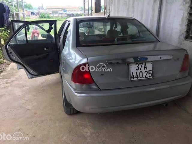 Xe Ford Laser Deluxe 1.6 MT 2001, màu bạc xe gia đình0