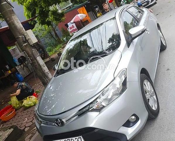 Cần bán lại xe Toyota Vios 1.5E sản xuất 2014, màu bạc, 318 triệu0