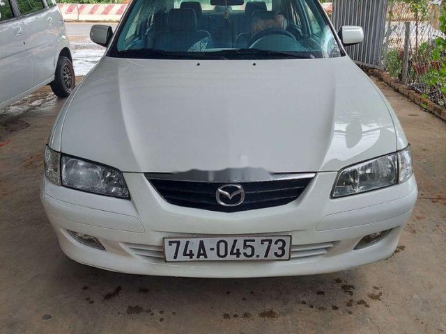 Cần bán Mazda 626 đời 2002, màu trắng còn mới0