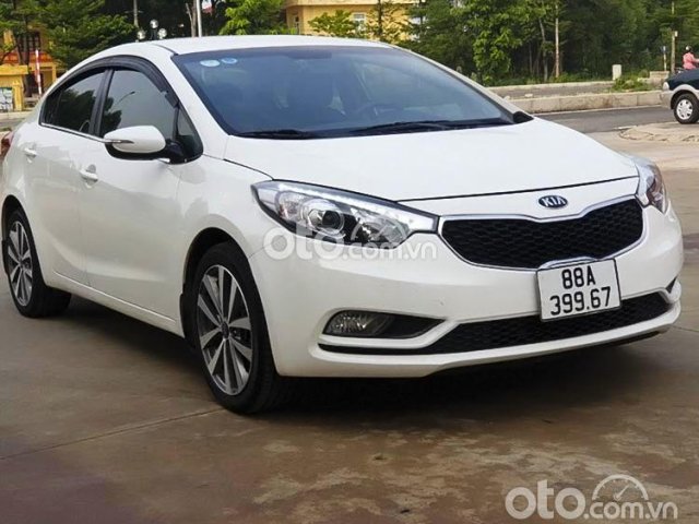 Cần bán xe Kia K3 1.6 AT đời 2015, màu trắng số tự động0