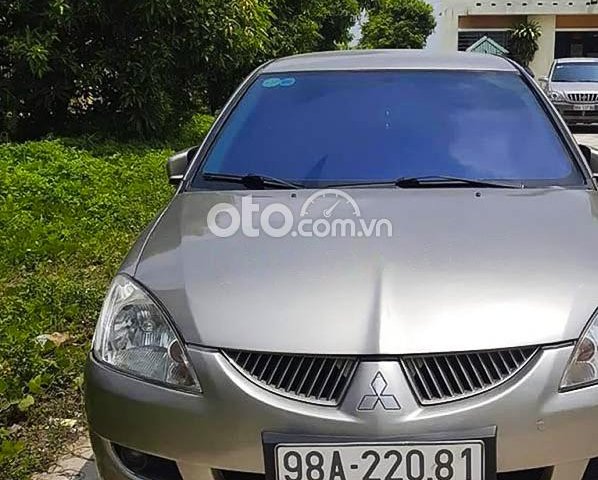 Bán ô tô Mitsubishi Lancer Gala GLX 1.6AT 2005, màu vàng 