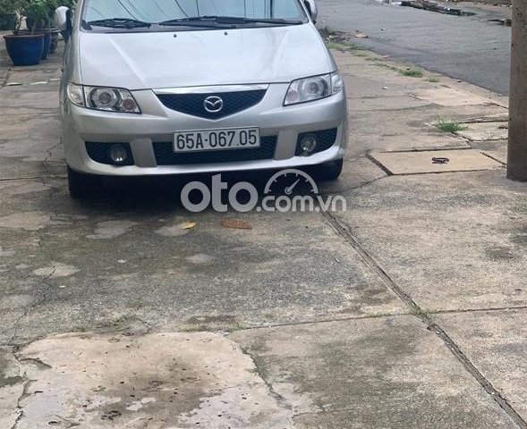 Cần bán xe Mazda Premacy đời 2003, màu bạc0