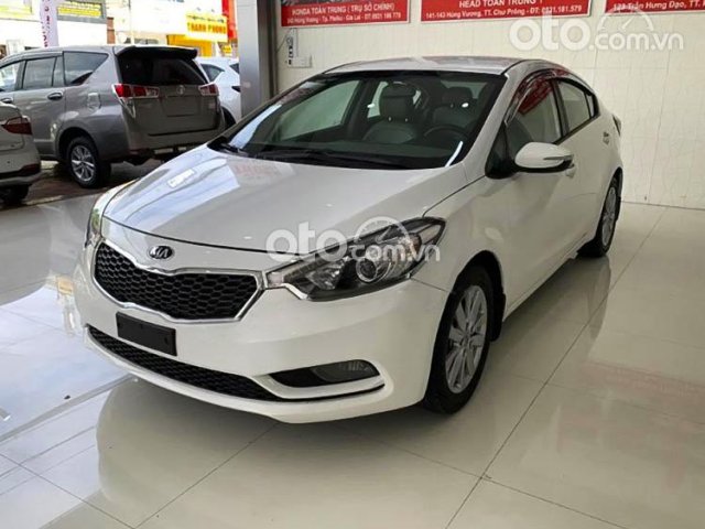 Cần bán gấp Kia K3 1.6 MT sản xuất năm 2015, màu trắng