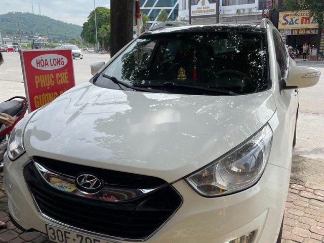 Cần bán xe Hyundai Tucson đời 2011, màu trắng, xe nhập0