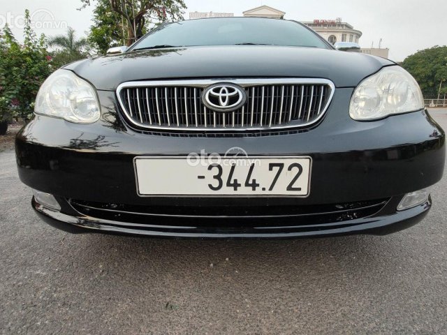 Cần bán lại xe Toyota Corolla Altis năm 2002, màu đen còn mới0