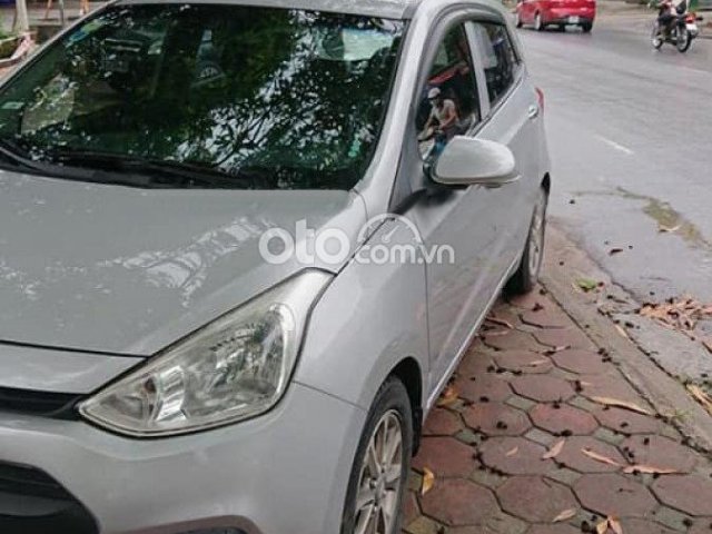 Cần bán xe Hyundai Grand i10 1.0 MT sản xuất 2015, màu bạc, nhập khẩu nguyên chiếc0