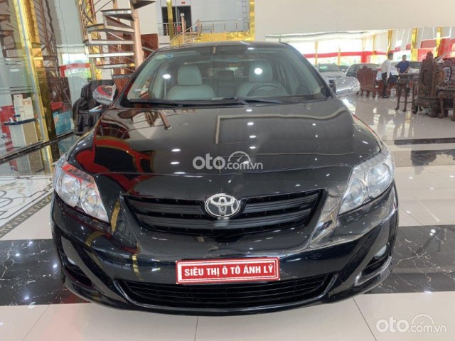 Cần bán xe Toyota Corolla Altis 1.8G MT sản xuất 2009, màu đen0