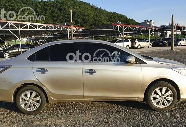 Cần bán lại xe Toyota Vios E sản xuất 2016, màu vàng cát, giá 333tr