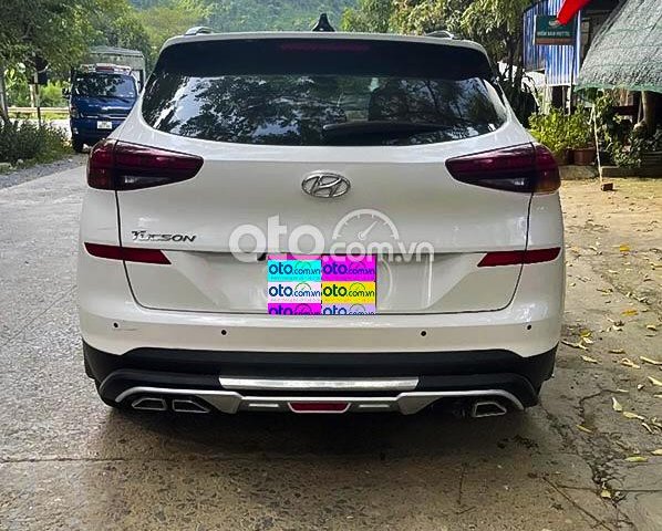 Cần bán Hyundai Tucson năm sản xuất 2020, màu trắng còn mới0