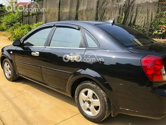 Bán ô tô Daewoo Lacetti EX sản xuất 2011, màu đen còn mới0