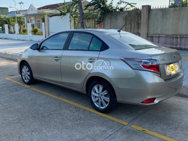 Cần bán xe Toyota Vios 1.5E 2018, màu vàng còn mới giá cạnh tranh0