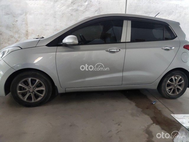 Cần bán xe Hyundai Grand i10 1.0 MT năm 2014, màu bạc, nhập khẩu còn mới0