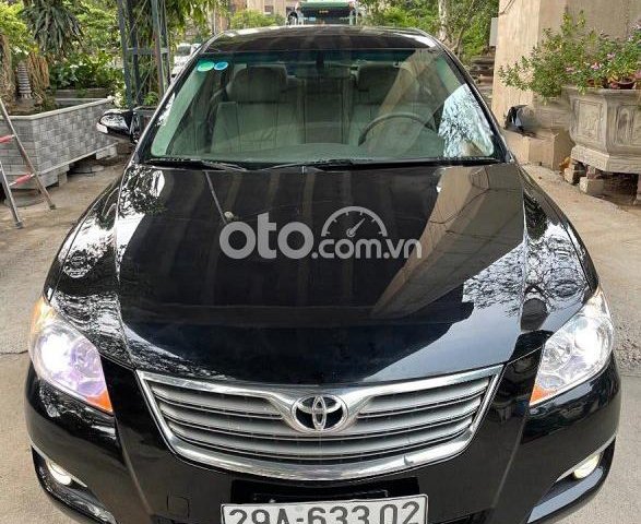 Cần bán Toyota Camry đời 2008, màu đen chính chủ0