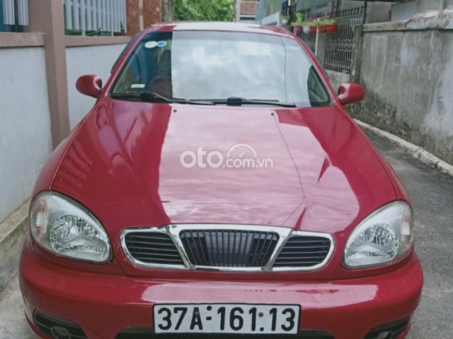 Bán ô tô Daewoo Lanos sản xuất 2000, màu đỏ còn mới0