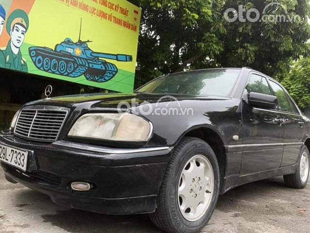 Cần bán gấp Mercedes 1999, màu đen, nhập khẩu nguyên chiếc số tự động, giá tốt0
