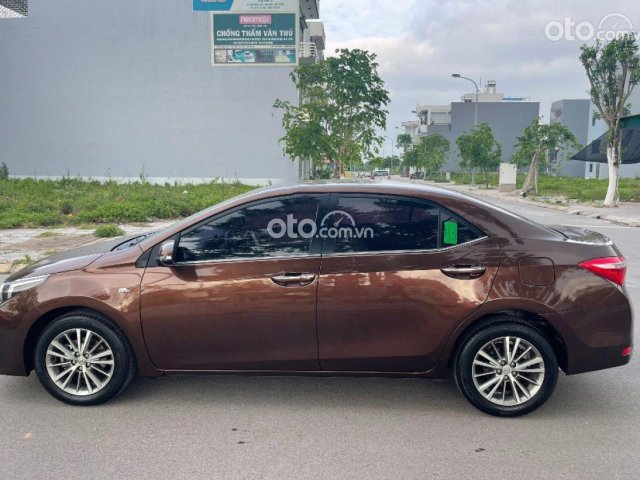 Bán xe Toyota Corolla Altis đời 2015, màu nâu số tự động, 540tr0