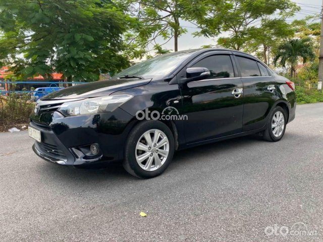 Cần bán Toyota Vios MT năm 2014, màu đen0