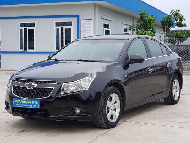 Cần bán xe Chevrolet Cruze đời 2011, màu đen số sàn0