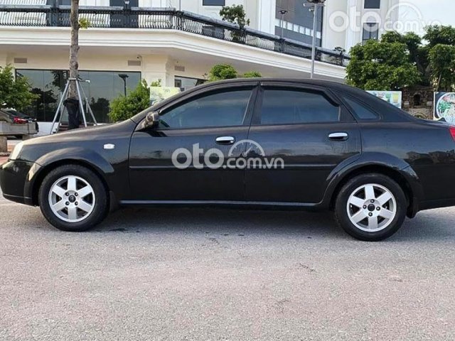 Cần bán gấp Daewoo Lacetti Max 1.8 MT 2007, màu đen0