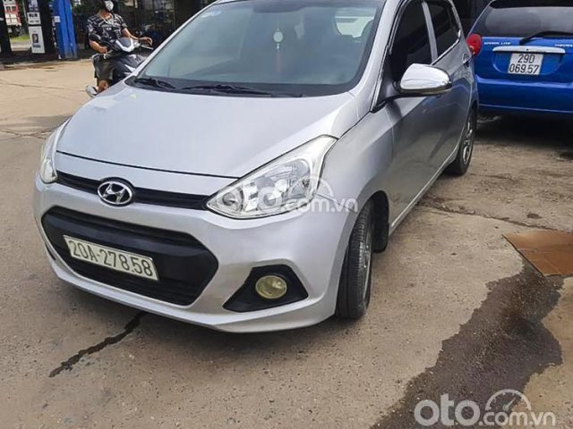 Cần bán gấp Hyundai Grand i10 sản xuất năm 2015, màu bạc 0