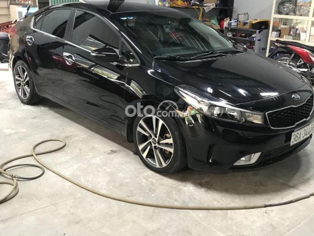 Bán Kia Cerato 1.6 MT sản xuất 2018, màu đen như mới, giá tốt0