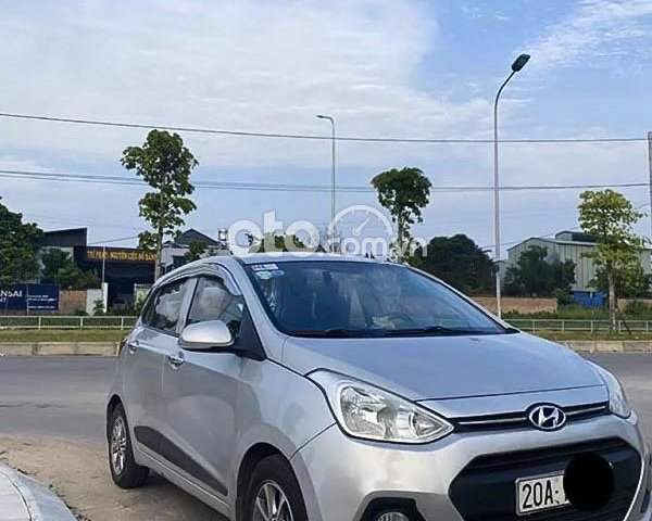 Bán Hyundai Grand i10 đời 2015, màu bạc, nhập khẩu nguyên chiếc  0