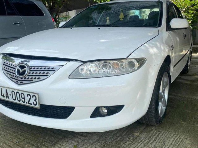 Cần bán Mazda 6 2.0 MT sản xuất năm 2004, màu trắng ít sử dụng0