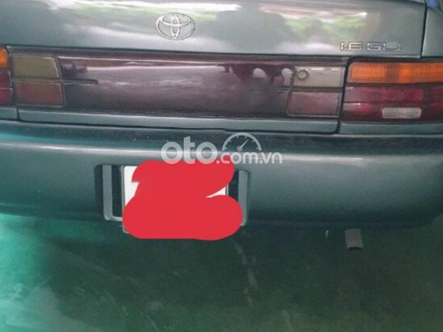 Cần bán gấp Toyota Corolla đời 1995, màu xám, nhập khẩu0